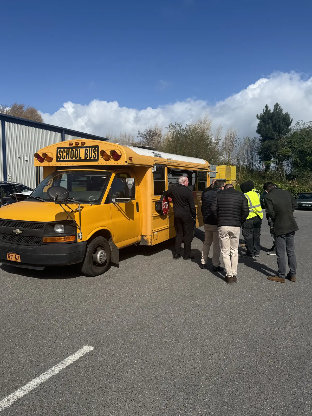 Customers queuing at the Burger Bus hatch
