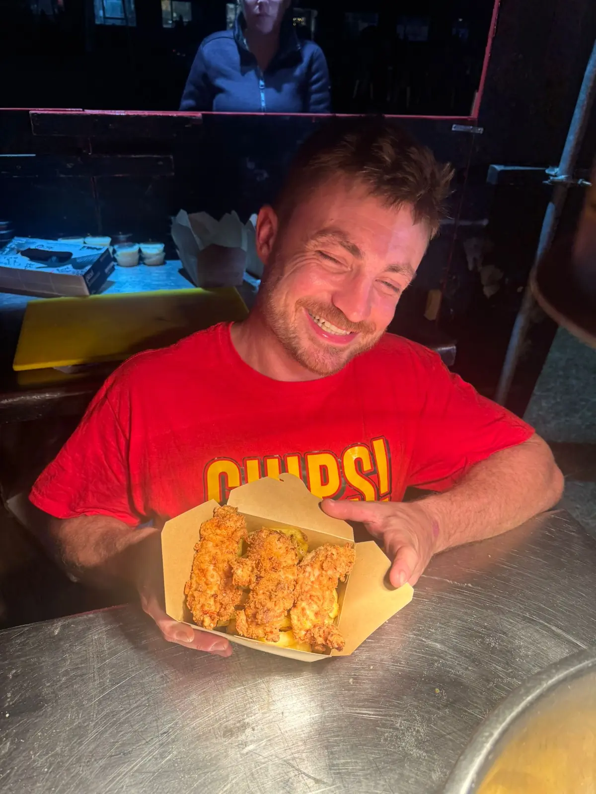 A box of CHIPS! crispy chicken strips and chips at the hatch