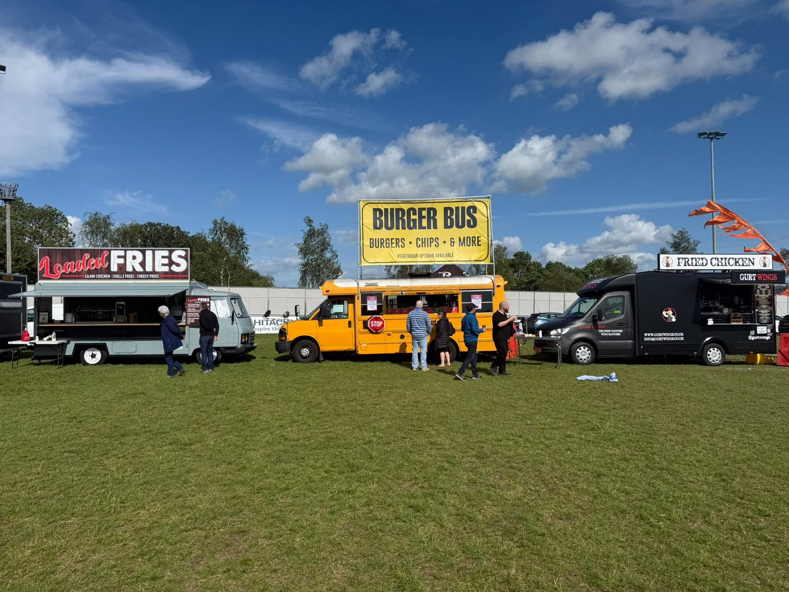 Burger Bus at a festival, with neighbouring street food trucks