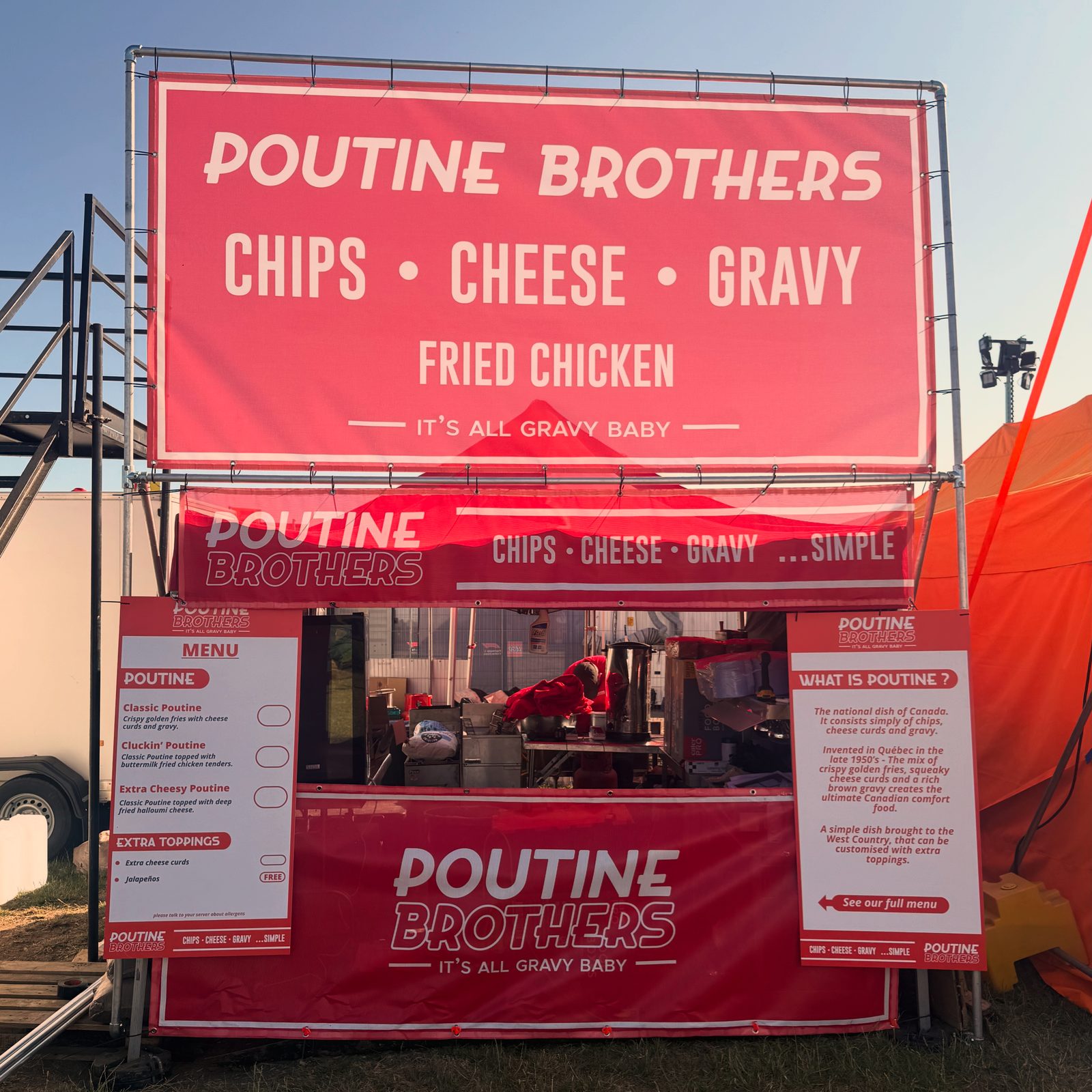 Poutine Brothers stall with menu board